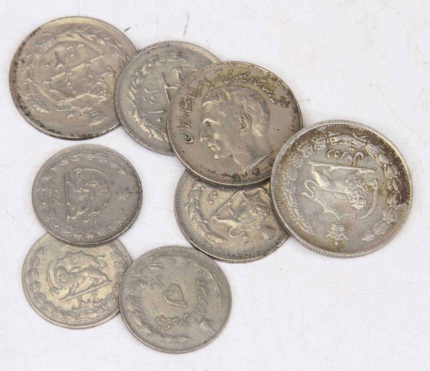 An album of mainly middle eastern coins to include examples from Iran (Dinars, Rials & Pahlavi),