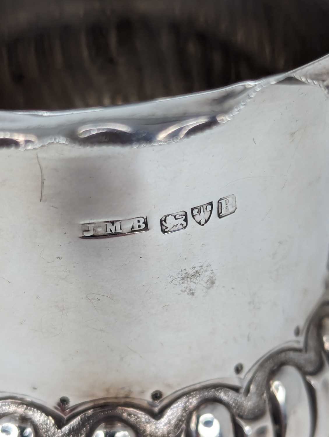 A late Victorian silver bowl, having a shaped rim to a cylindrical body and wrythen moulded base, - Image 2 of 3