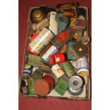 A collection of vintage tins and moneyboxes to include Baker's Solderine and Thorne's Cream Toffee