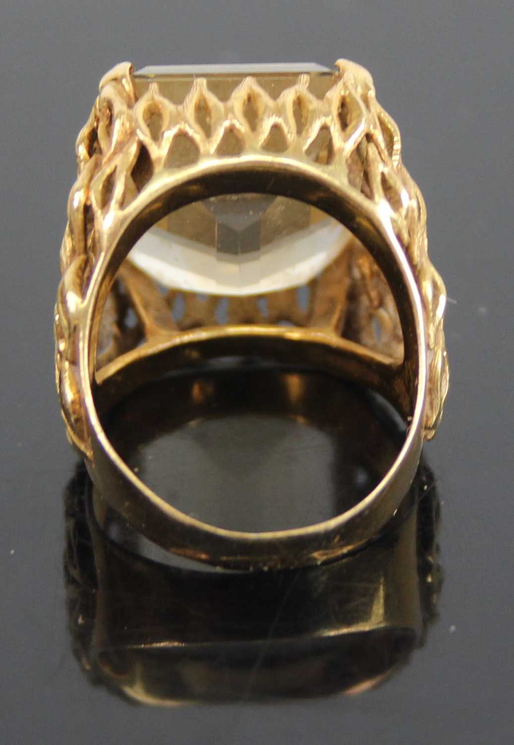 A modern 18ct gold topaz set dress ring, the four-claw set baguette cut topaz measuring approx 18. - Image 2 of 2