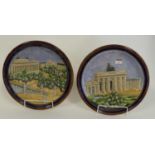 A pair of German pottery wall plates, each relief decorated with architectural scenes of Berlin,