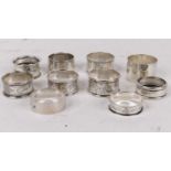 A collection of ten silver napkin rings, 5.5ozt