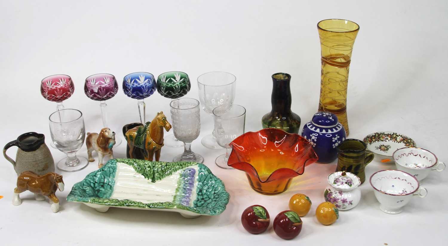 A collection of ceramics and glassware to include cut glass wine hocks, Chris Ashton Pottery jug,