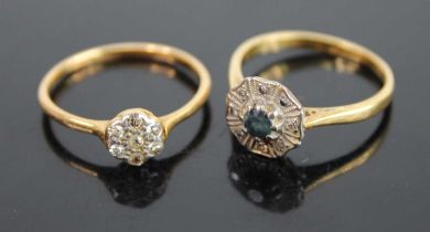 An 18ct gold diamond flower head cluster ring, arranged as seven small round cuts, setting dia.6.