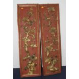 A pair of Chinese red lacquered and gilt high relief panels, each decorated with birds amongst