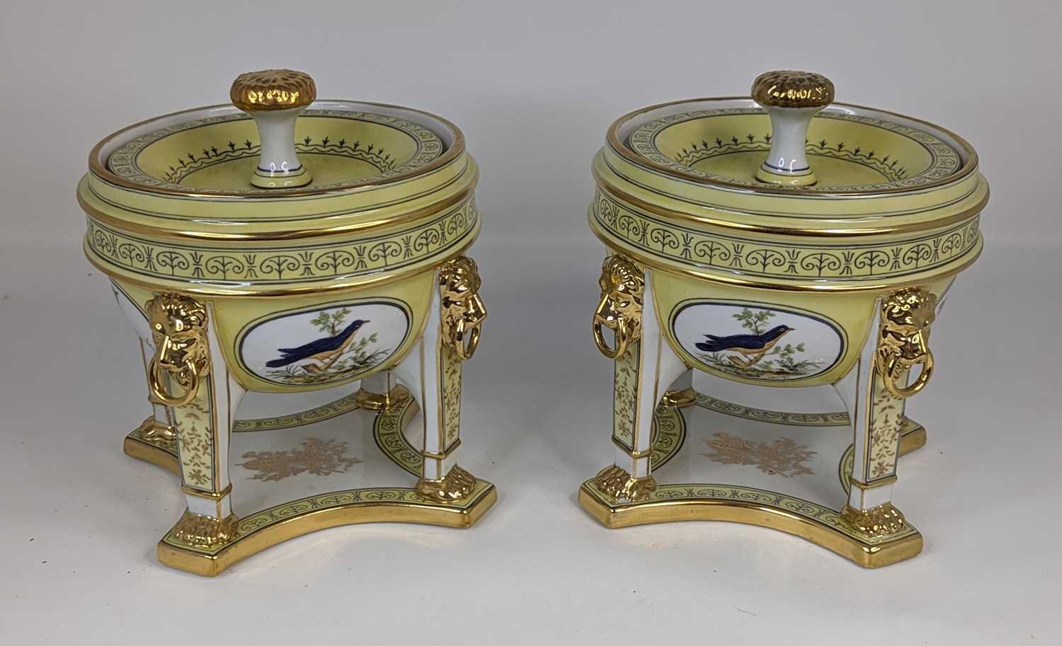 A pair of continental style porcelain pot pourri, transfer decorated with birds, height 18cm In good