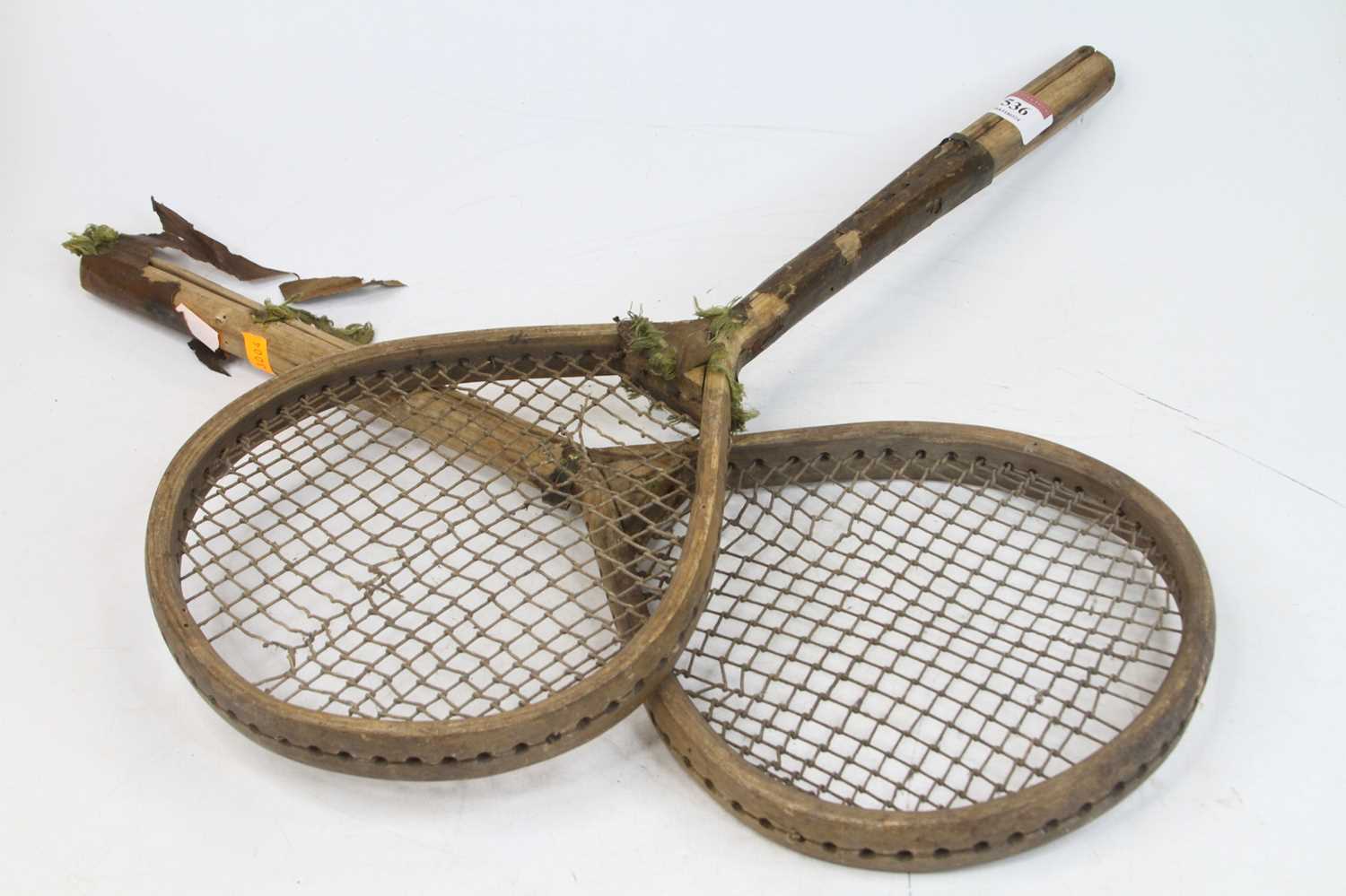 A pair of early 20th century tennis racquets, length 50cm