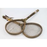A pair of early 20th century tennis racquets, length 50cm