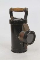 A Ceag Ltd of Barnsley black painted metal hand-held miner's lamp, h.21cm