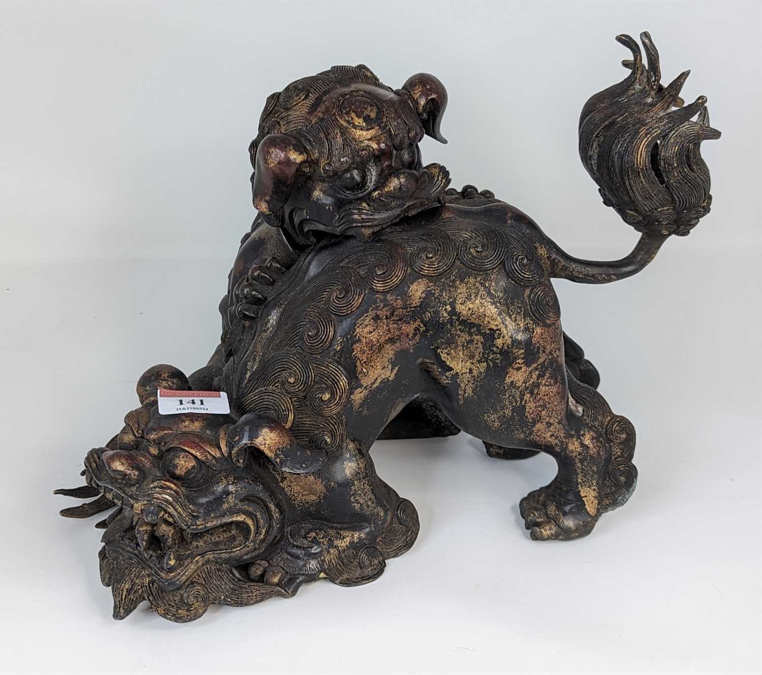 A Chinese gilt metal censer in the form of two dogs of fo, height 24cm