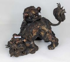 A Chinese gilt metal censer in the form of two dogs of fo, height 24cm