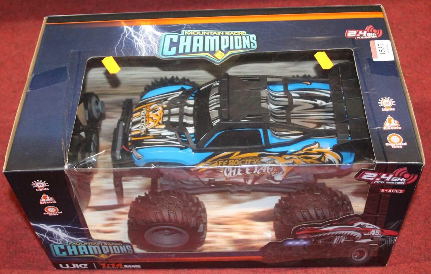 A radio controlled 1:14 scale boxed Ferocity Cheater by Mountain Racing Champions