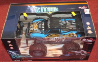 A radio controlled 1:14 scale boxed Ferocity Cheater by Mountain Racing Champions