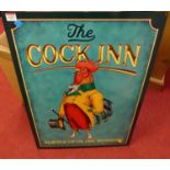 A lithograph printed tin sign 'The Cock Inn', 70 x 50cm