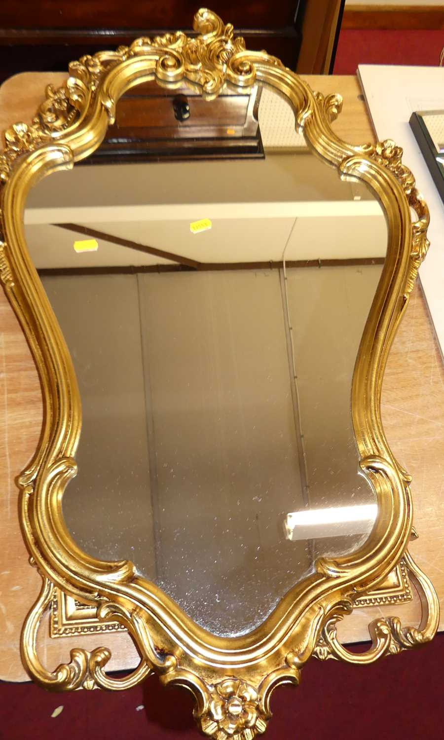 A gilt composition oval wall mirror, 20th century, 64 x 41cm; together with two others (3) - Image 2 of 3