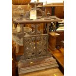 A cast metal and timber divisional stick stand, height 74cm, width 48cm Height 74cm, Width 48cm.