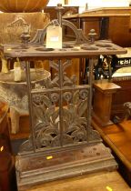 A cast metal and timber divisional stick stand, height 74cm, width 48cm Height 74cm, Width 48cm.