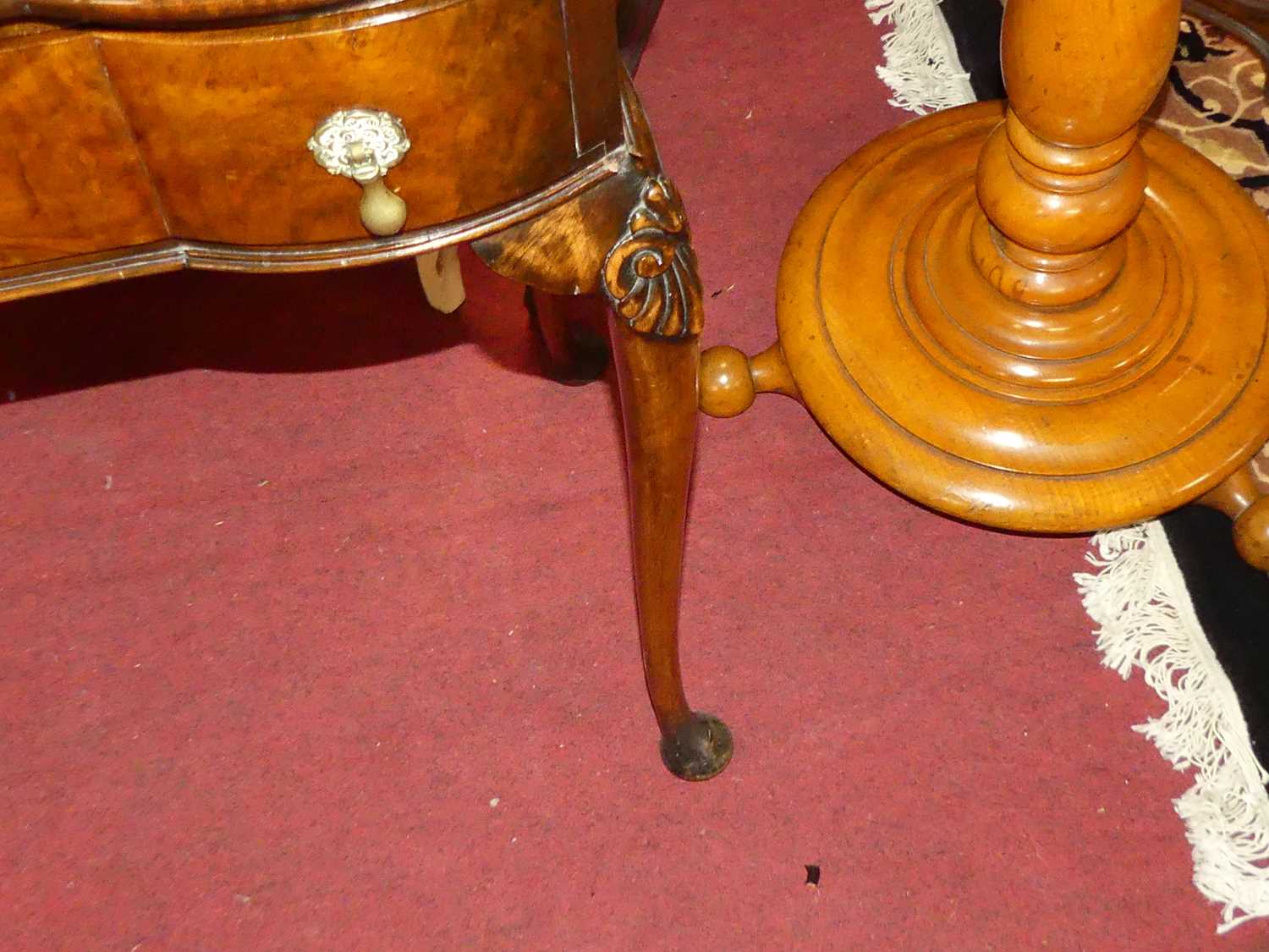 A 1930s figured walnut serpentine single drawer side table, raised on shell capped cabriole - Image 4 of 4