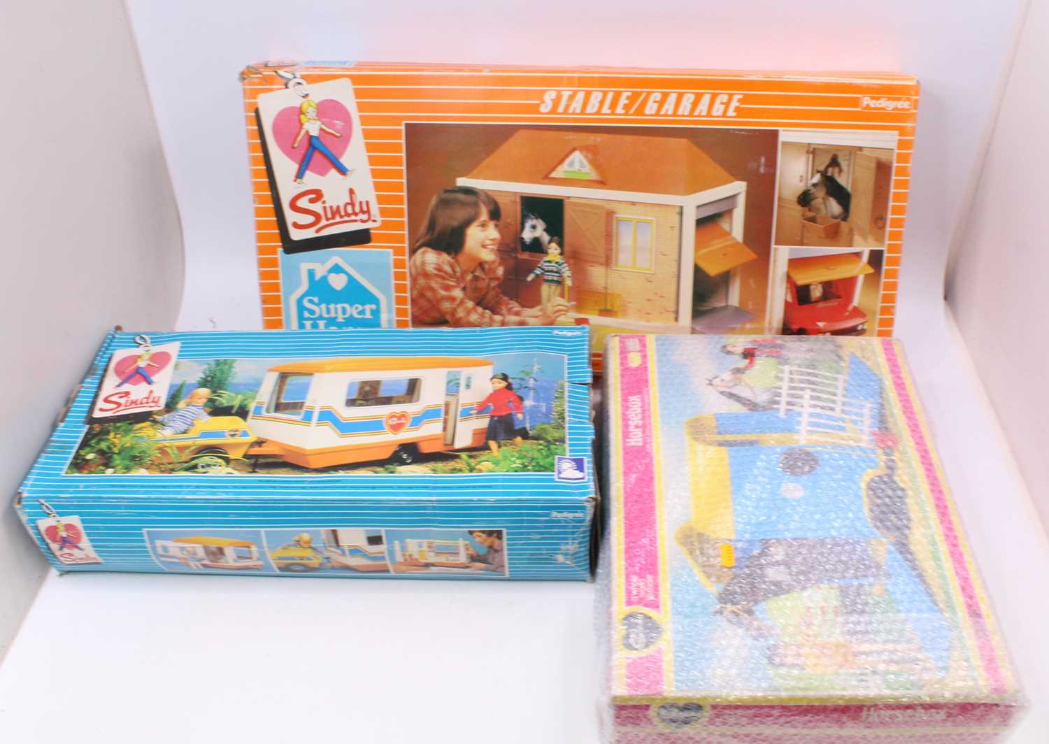 A collection of Sindy boxed accessories, to include the boxed Superhome, horsebox, and caravan