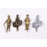 A collection of cast metal Lonestar products, figurines of Marilyn Monroe, Charlie Chaplin, and WC