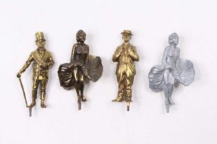 A collection of cast metal Lonestar products, figurines of Marilyn Monroe, Charlie Chaplin, and WC