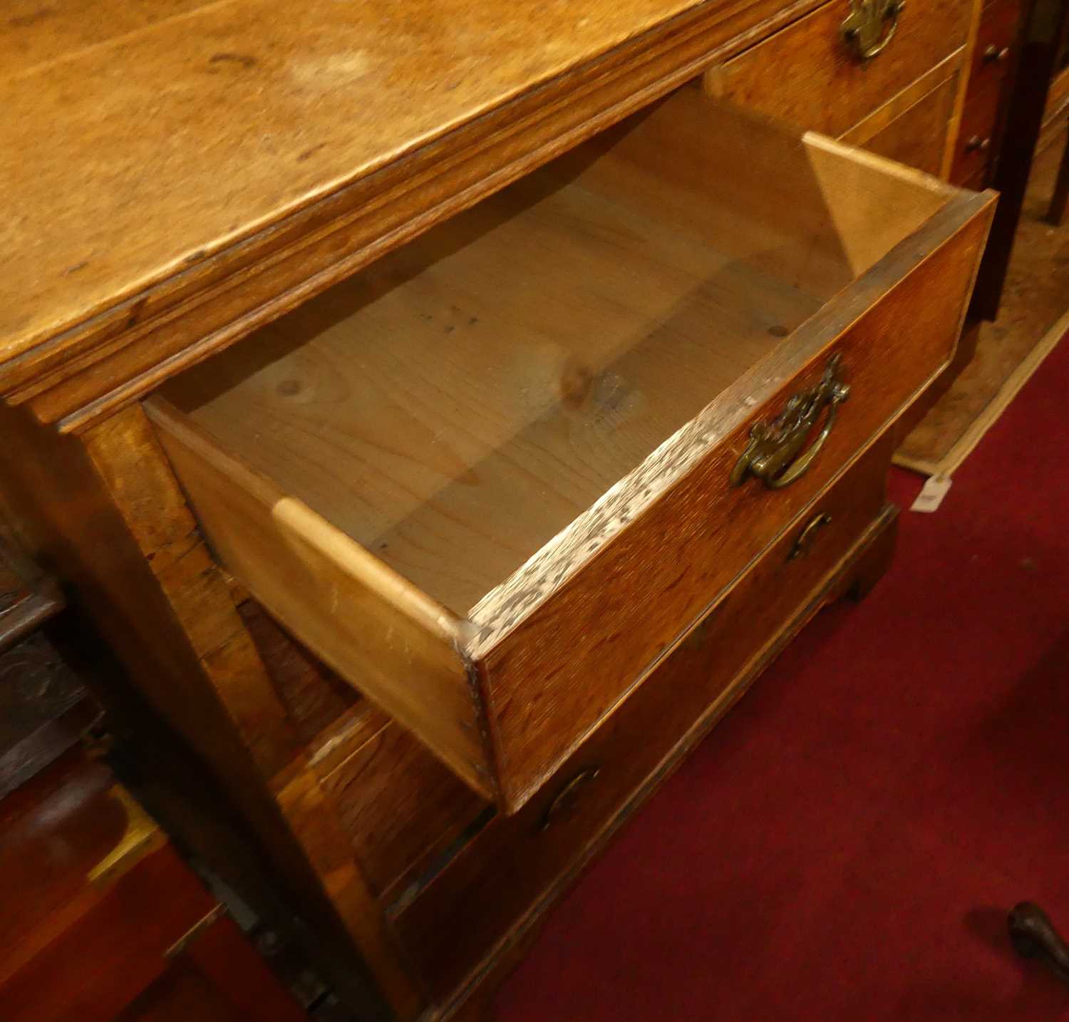 A George III oak squarefront chest of two short over three long graduated drawers, w.101cm - Image 4 of 4