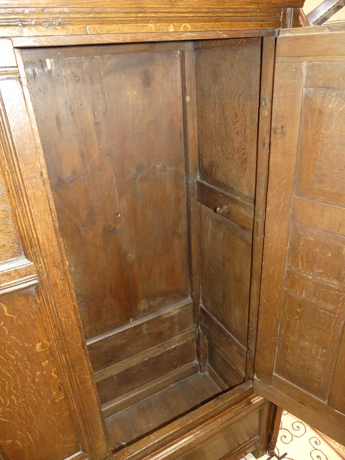 An antique joined oak double door panelled side cupboard, w.128cm - Image 5 of 5