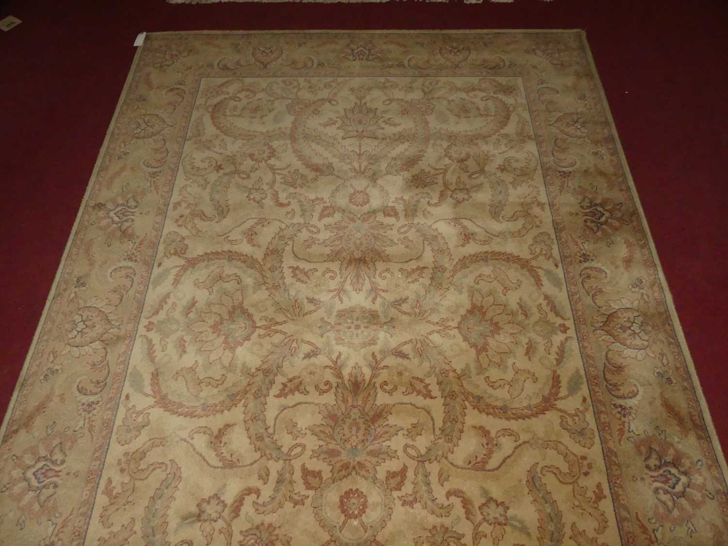 A Persian style machine made cream ground woollen Tabriz rug, 300 x 200cm - Image 3 of 6