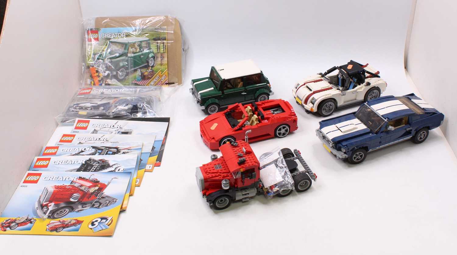 A selection of various constructed Lego kits to include No. 10265 Ford Mustang, No. 10242 Mini,