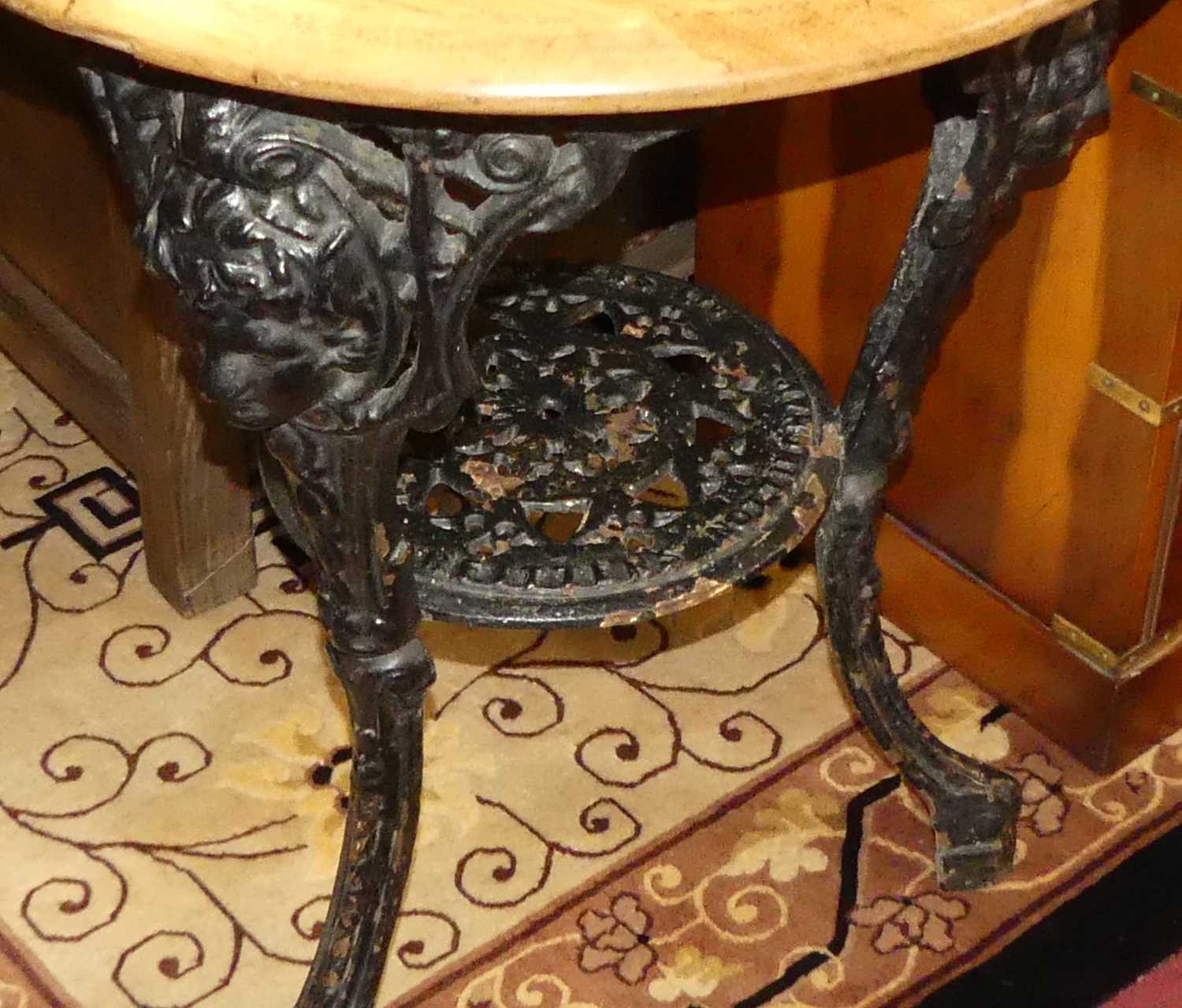 An early 20th century black painted pierced cast iron based pub table, by Caskell & Chambers Ltd - Image 2 of 2