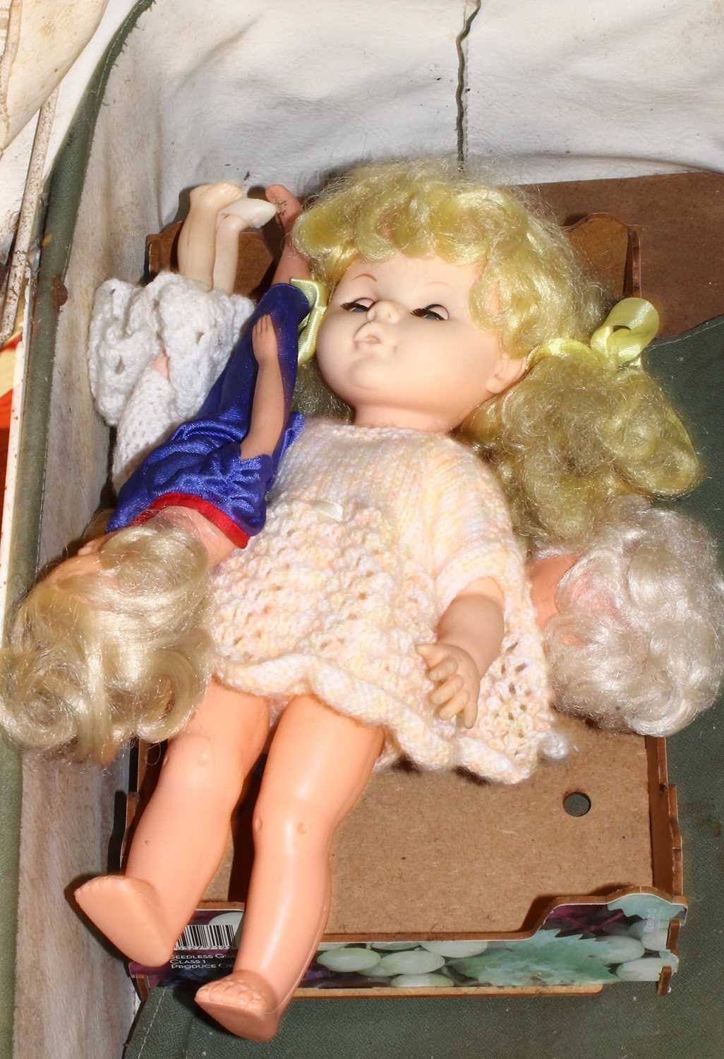 A vintage child's pram with a quantity of celluloid and plastic dolls - Image 2 of 2