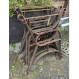 Five pairs of cast iron bench ends, each having scroll detail