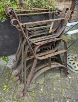 Five pairs of cast iron bench ends, each having scroll detail