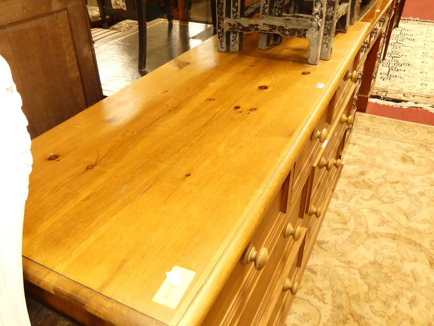 A modern pine long side chest, fitted with an arrangement of seven various drawers, w.166cm - Image 2 of 5