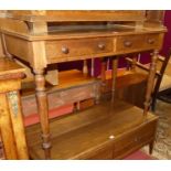 A Regency mahogany three-quarter gallery backed two drawer washstand, raised on turned tapering