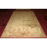 A Persian style machine made cream ground woollen Tabriz rug, 300 x 200cm