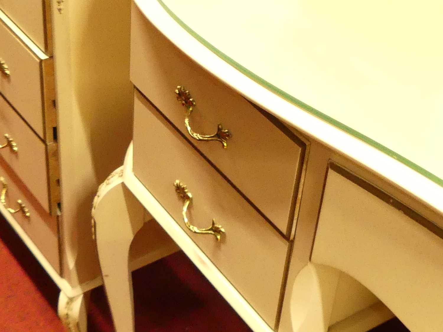 A suite of French white wood bedroom furniture, to include; a kidney shaped kneehole mirrorback - Image 4 of 9