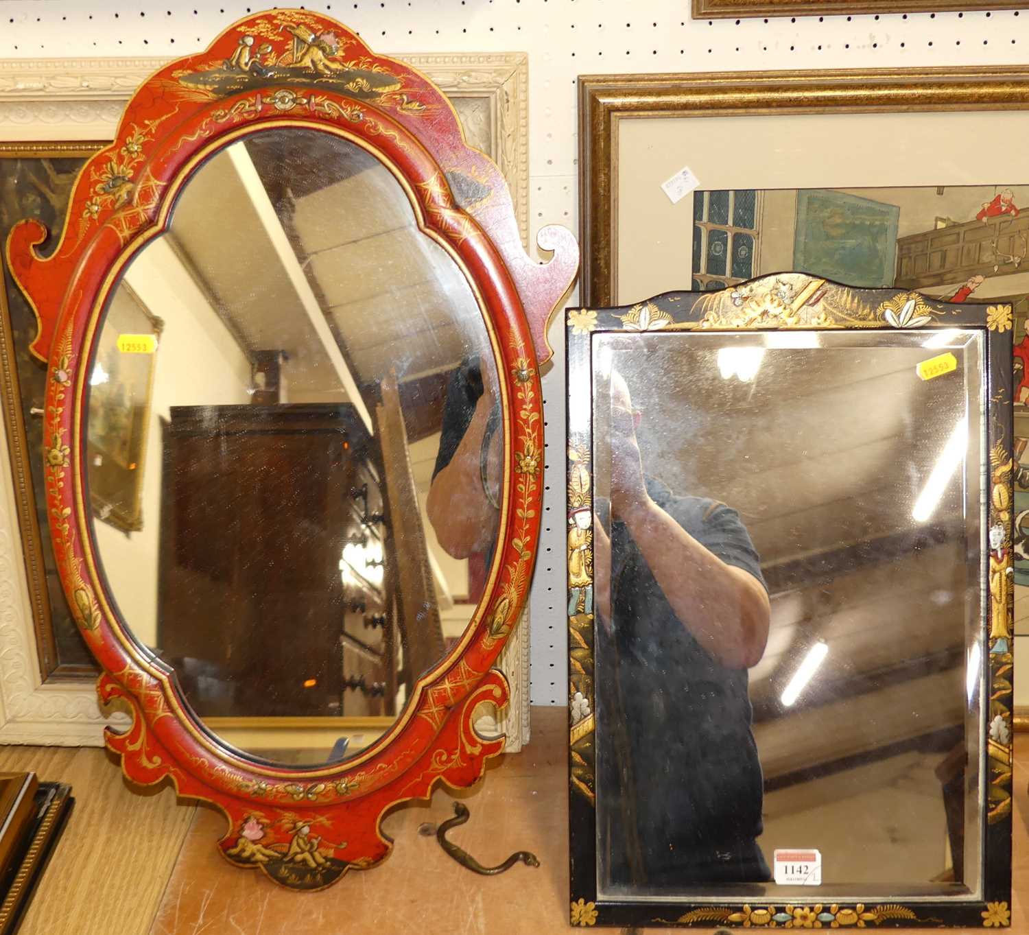 A chinoiserie black lacquered and bevelled easel mirror, 46 x 31cm; together with a Japan red