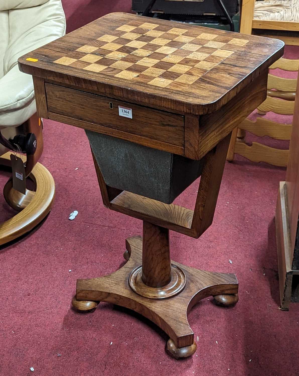 A William IV rosewood and inlaid chessboard topped work table, having single frieze door over basket