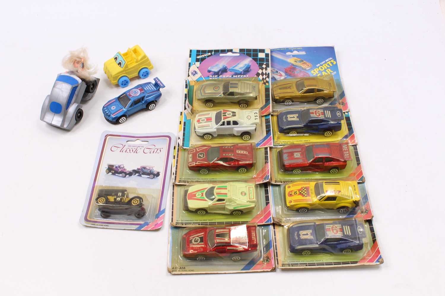 A collection of carded and loose plastic Made in Hong Kong sports cars, to include B1-B4 Nart race