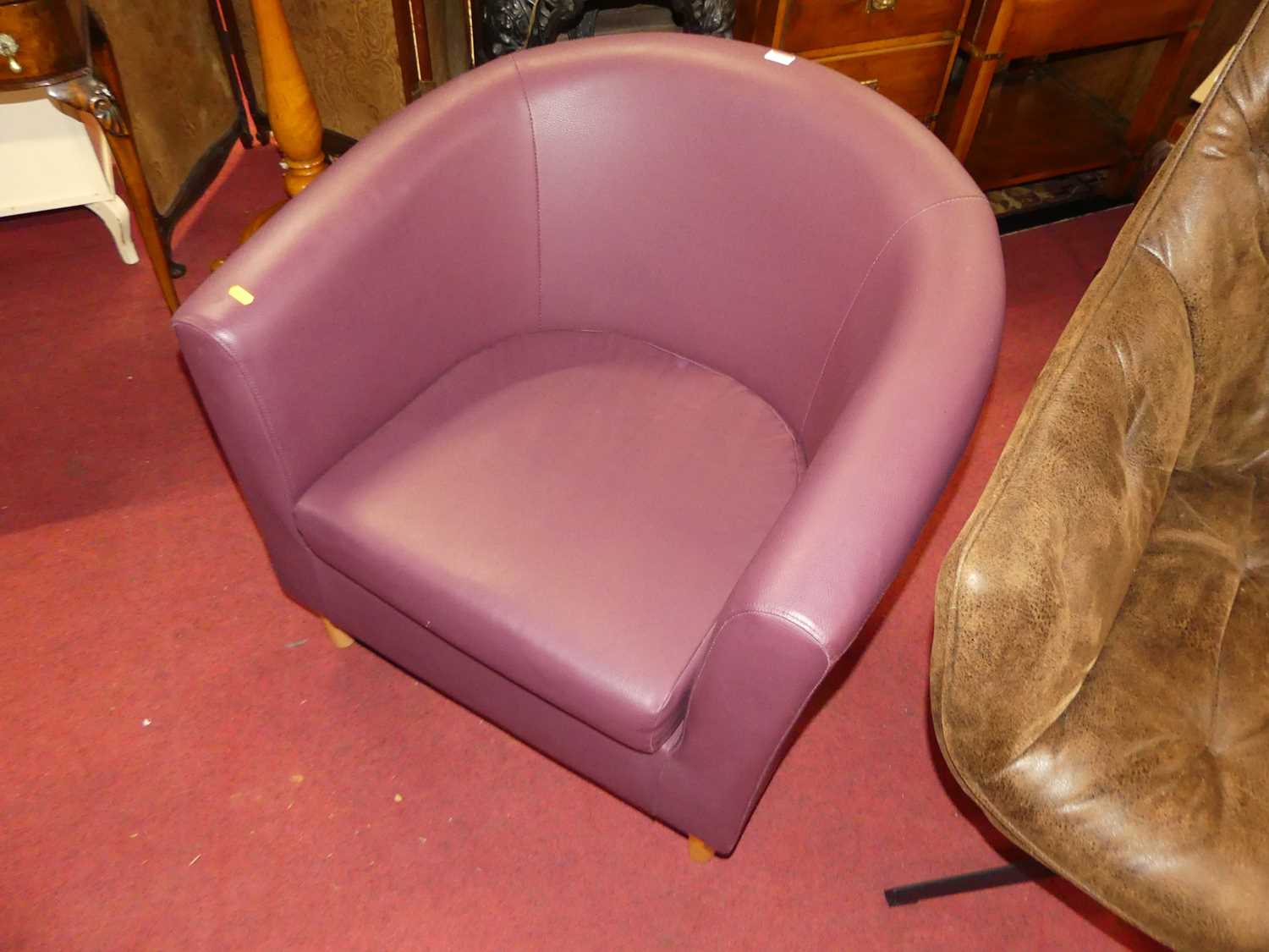 A contemporary soft tan leather upholstered tub swivel armchair, together with a contemporary purple - Image 2 of 4