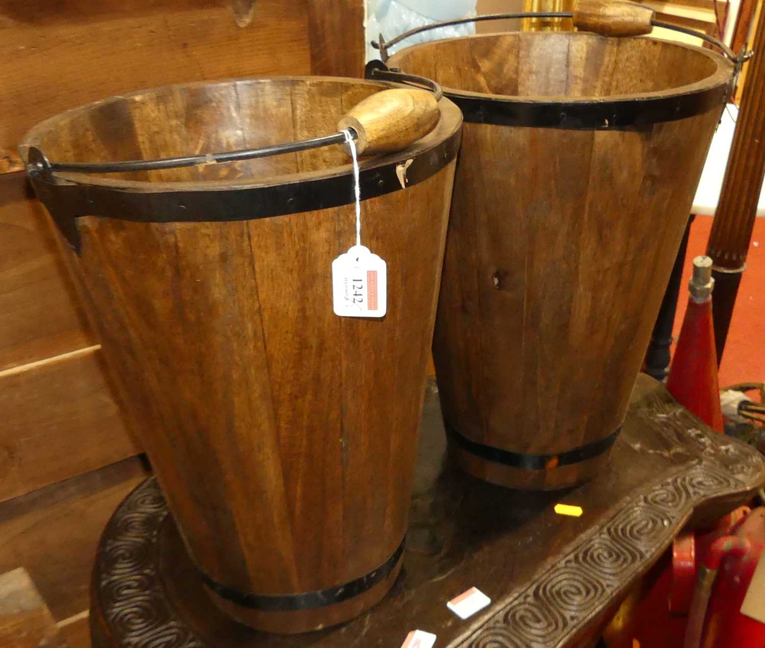 A pair of contemporary stained hardwood and metal bound champagne buckets, each with swing handles