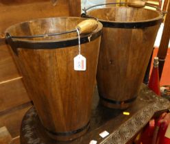 A pair of contemporary stained hardwood and metal bound champagne buckets, each with swing handles