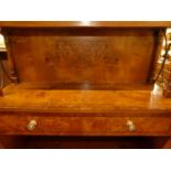 An Edwardian low two drawer side table; together with a reproduction waterfall open bookshelf with