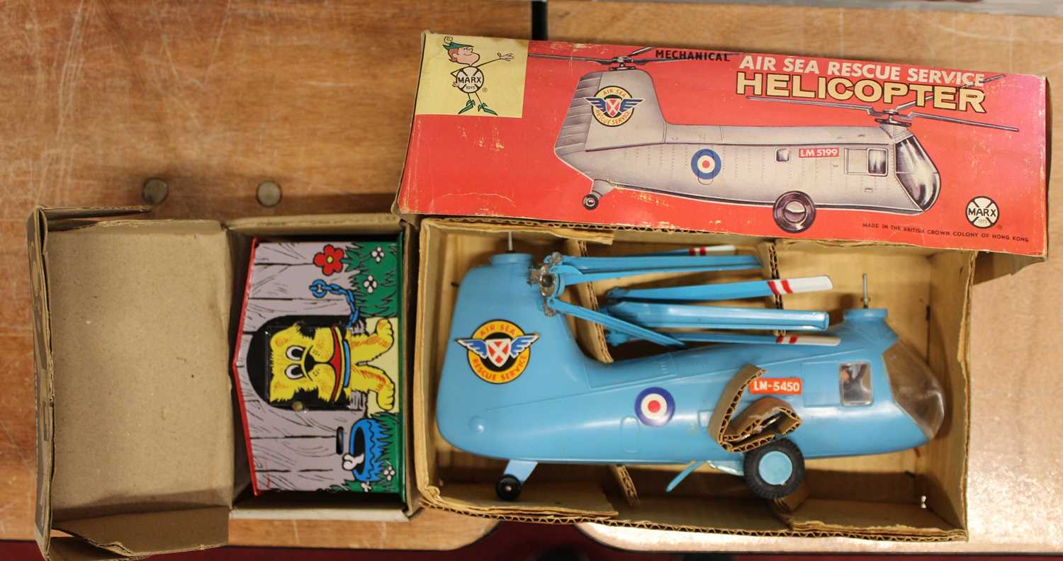 A Marx Toys mechanical helicopter, with revolving blades; together with a reproduction Classical