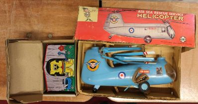A Marx Toys mechanical helicopter, with revolving blades; together with a reproduction Classical