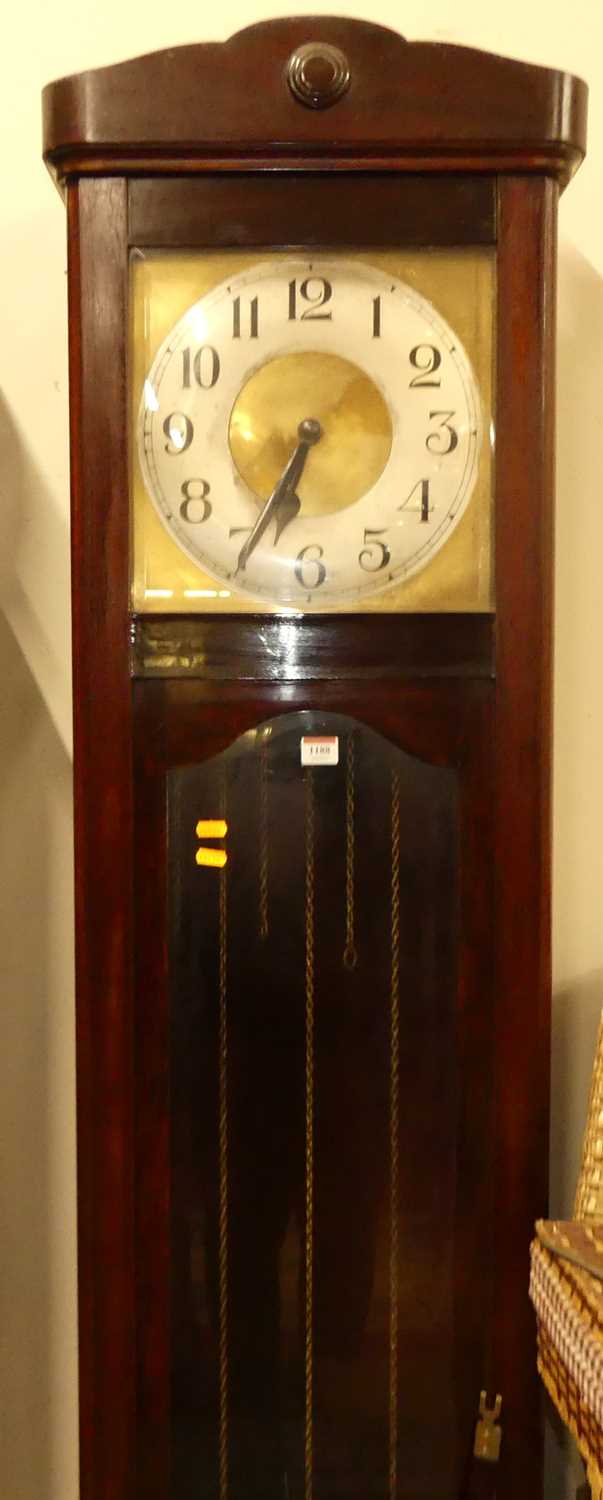 A 1920s stained beechwood longcase clock, having painted metal square Arabic dial, three train