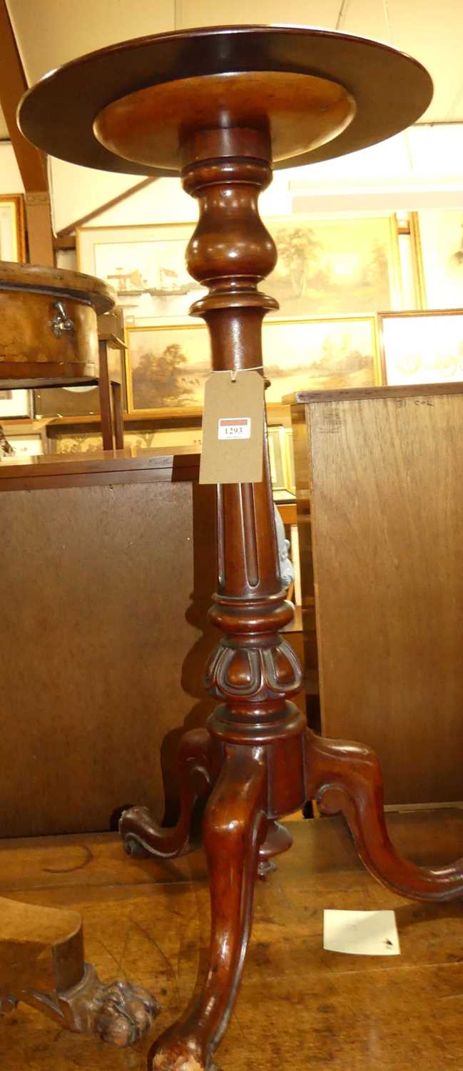 A Victorian mahogany circular topped pedestal occasional table, raised on turned and fluted column