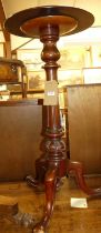 A Victorian mahogany circular topped pedestal occasional table, raised on turned and fluted column