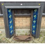 An Edwardian cast iron and tiled fire insert, 97 x 96cm